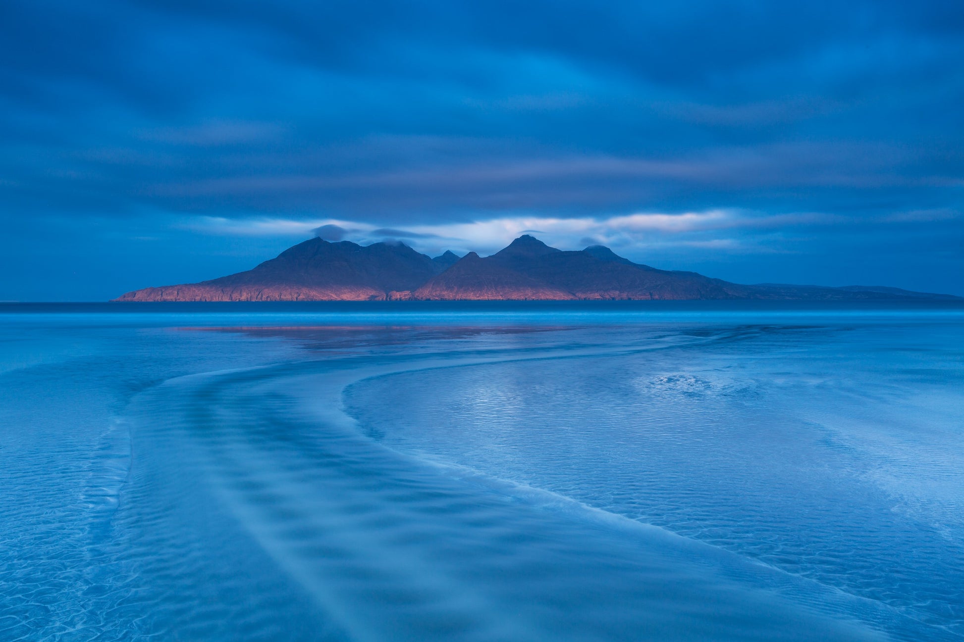 Freshwater river leading to the Isle of Rum in Scotland