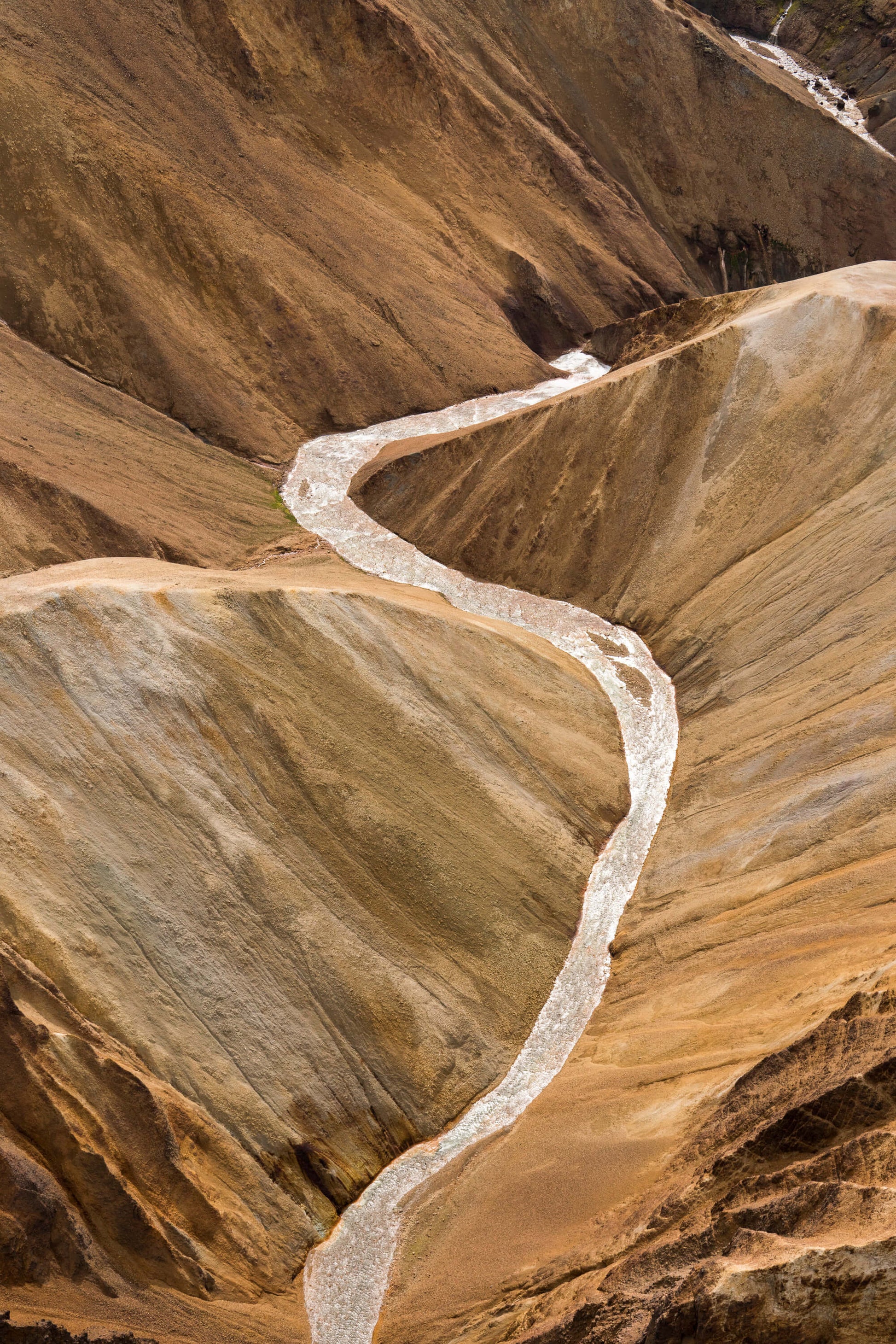 Twisting river through the Rhyolite Hills in Iceland