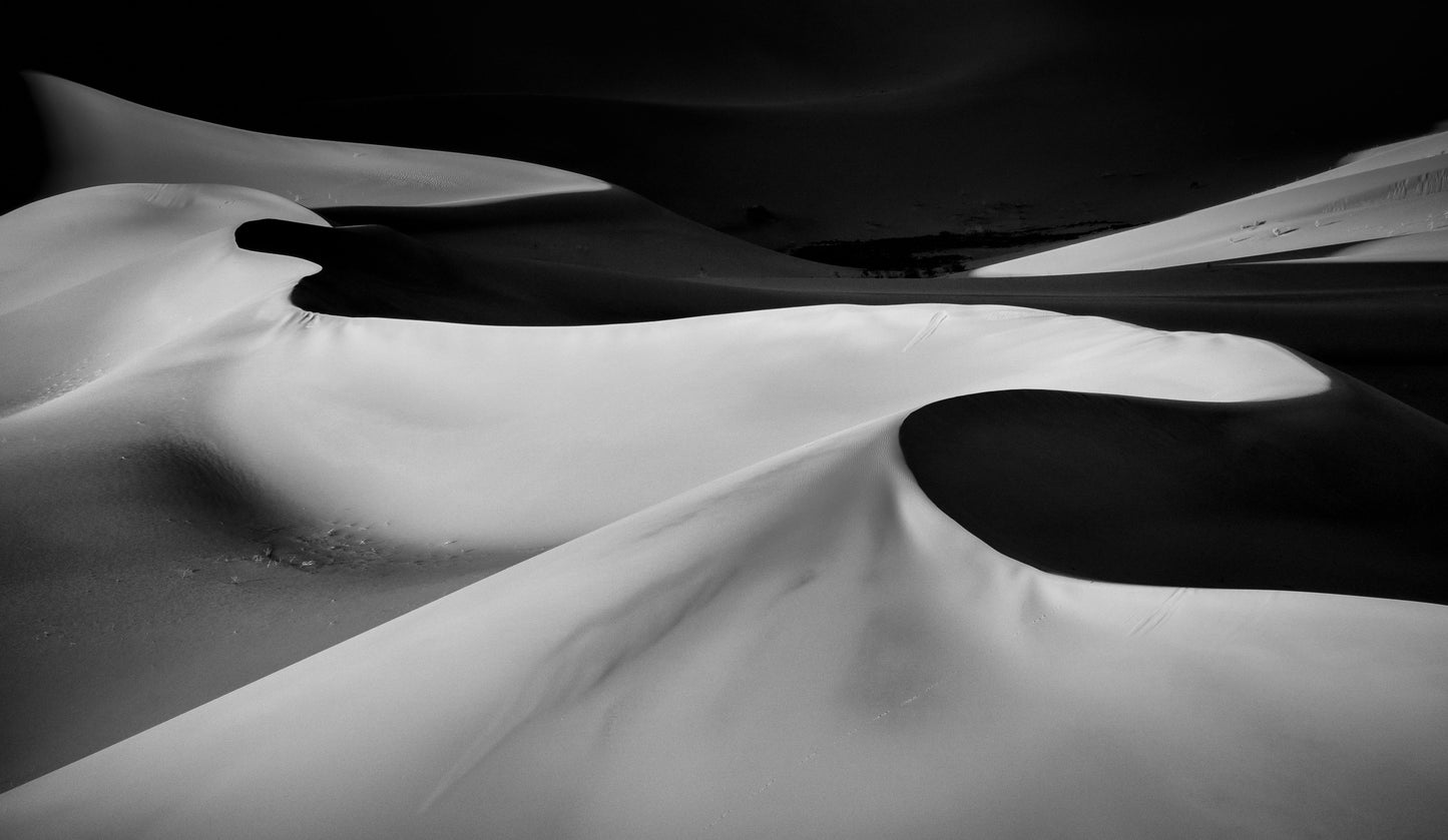 Black and white landscape of remote sand dunes in Death Valley